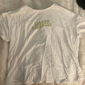 Very cute shirt. Not oversized but not tight. This shirt is great quality.